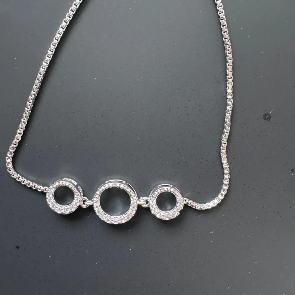 Elegant Silver adjustable Bracelet with Circular Accents